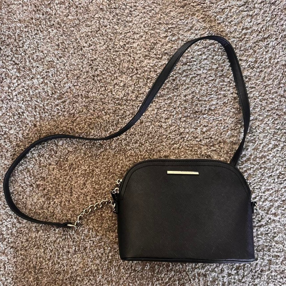 Black Steve Madden crossbody bag with silver accents
